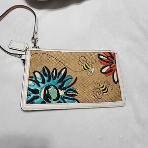 COACH floral bee wristlet